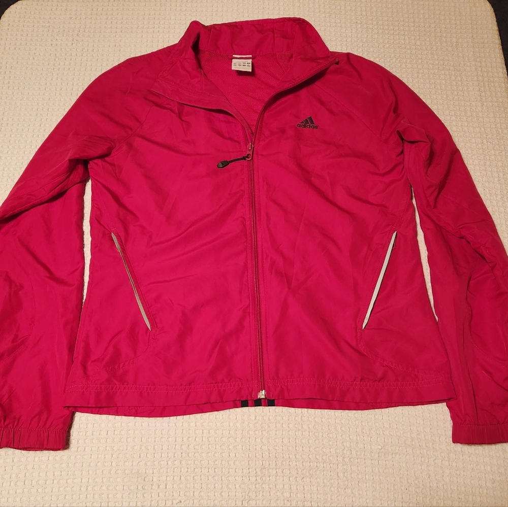 Adidas women's hot pink reflective running jacket. Size medium.